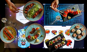 dishes on new touch tables in Covent Garden divided into 4 beneath