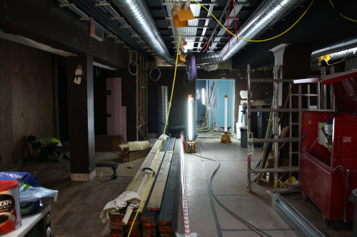 You can just see the ground floor kitchen space at the far end of the room…